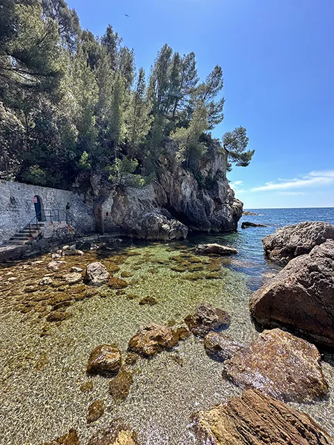 The clear water of Magaud cove